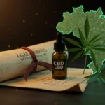 Documento legal e frasco de óleo de cannabis sobre mapa do Brasil, simbolizando a nova legislação e seu impacto.